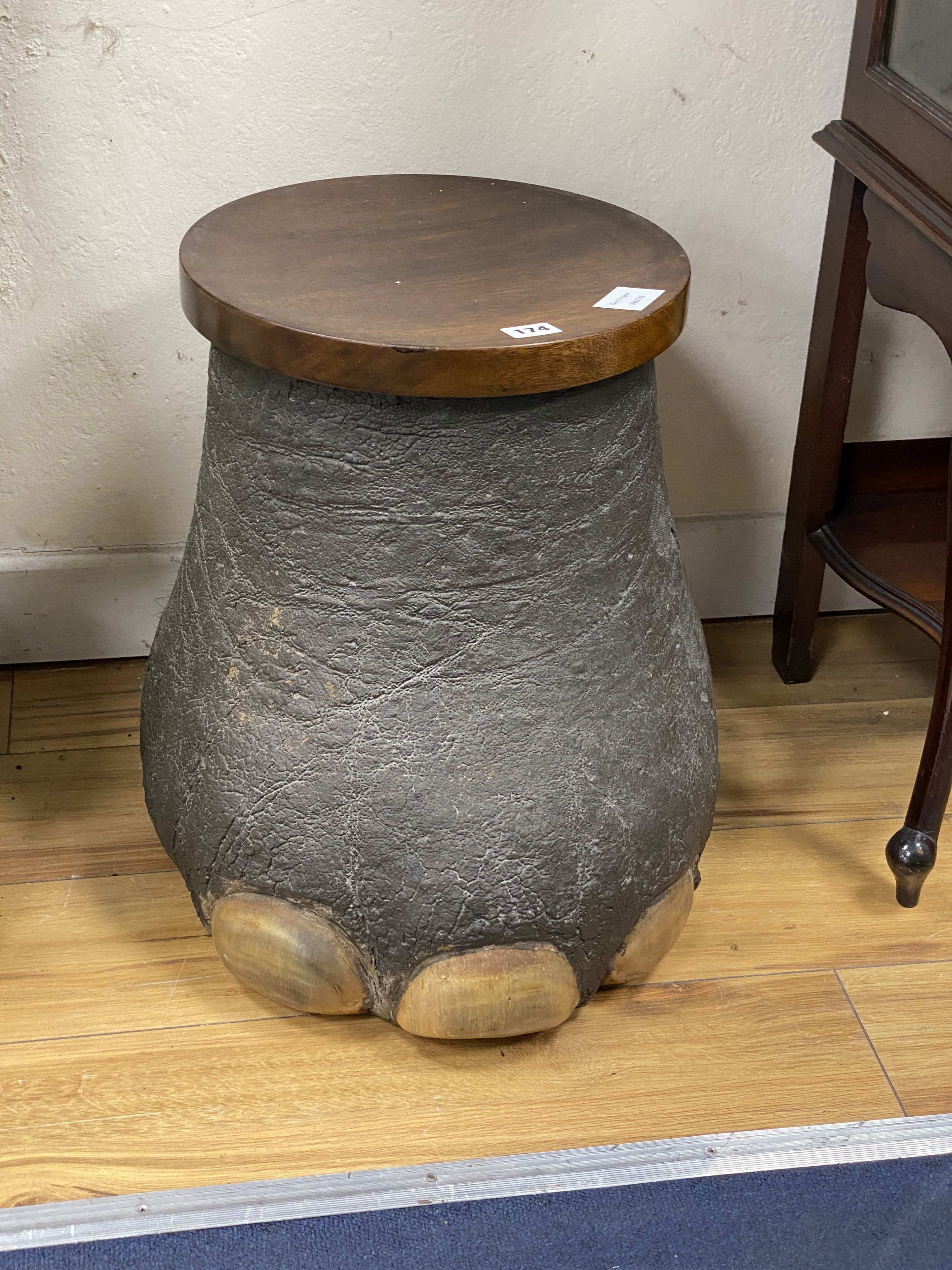 An elephant footstool, top diameter 32cm, height 43cm